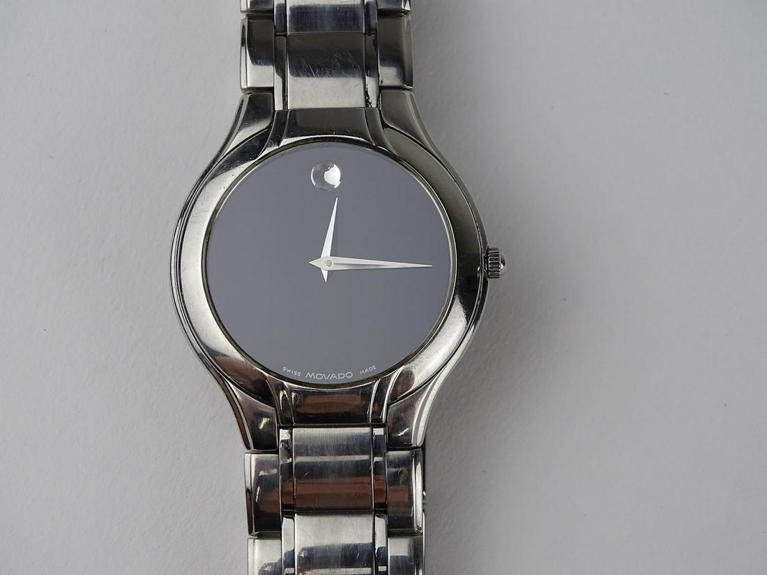 MOVADO MEN'S DRESS WATCH: #84-G2-1899. STAINLESS STEEL, QUARTZ, SAPPHIRE CRYSTAL, BUTTERFLY CLASP. RUNS BUT NEEDS BATTERY.