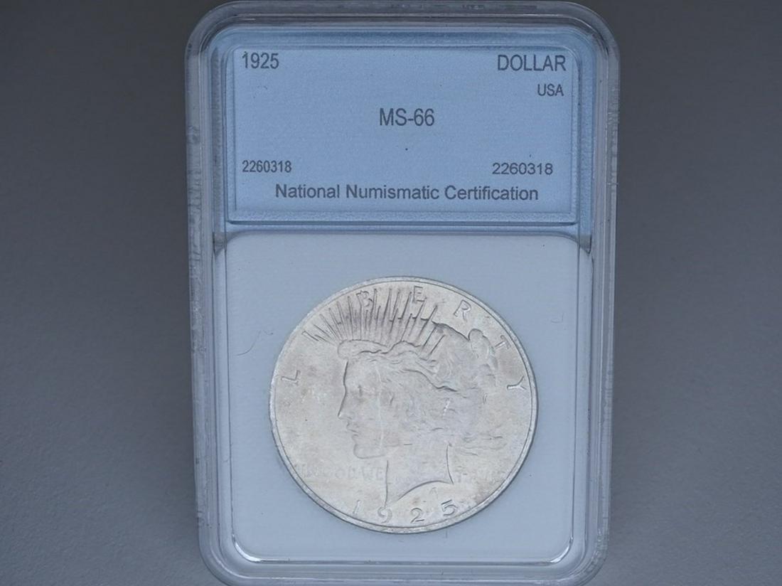 1925 PEACE SILVER DOLLAR (1 of 2)