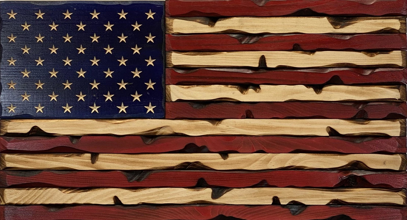 FOLK ART AMERICAN FLAG: WOOD CARVED AND DECORTED. 13"X24"