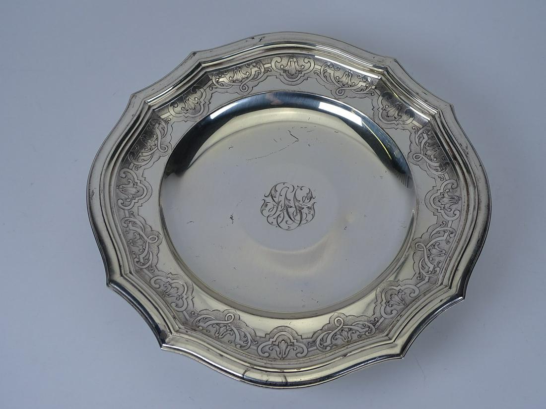 CARTIER STERLING SILVER TAZZA: SIGNED. MINOR DENT IN THE SERVING SURFACE. 703 GRAMS TOTAL WEIGHT.