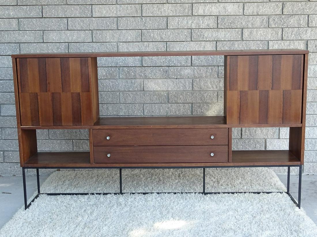 STANLEY FURNITURE MEDIA UNIT: ORIGINALLY PART OF THE PRECEEDING LOT 546, THIS UNIT GOES GREAT WITH IT OR WILL STAND ALONE. WALNUT WITH CONTRASTING TONES IN PANEL DOOR. ON IRON STRUCTURE BASE. 72"W, 12"D, 41"H