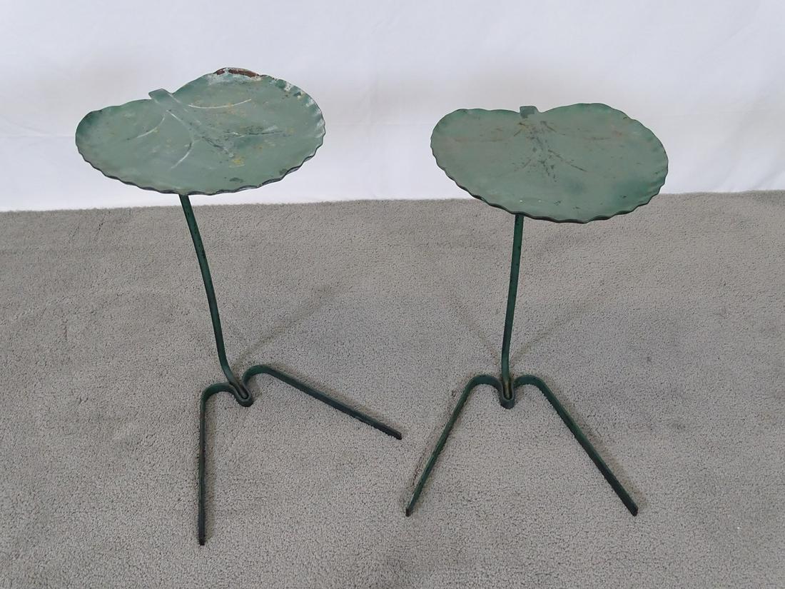 PAIR - SALTERINI LILY PAD TABLES: NESTING. LOSS OF FINISH CONSISTENT WITH AGE AND OUTDOOR USE.