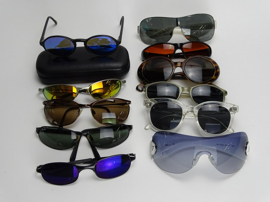 GROUPING OF DESIGNER SUNGLASSES: REVO, MAUI JIM, DOLCE CABANA, RAY-BAN, GUCCI, BLUEMARINE. ALL ARE USED HAVING SOME SIGNS OF WEAR.