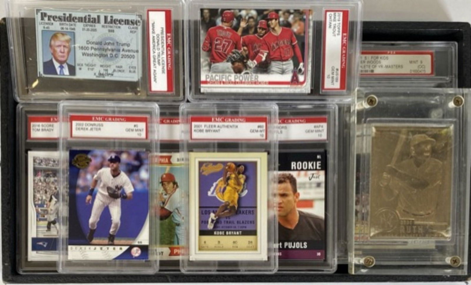 GROUPING OF GRADED SPORTS CARDS: NINE CARDS, INCLUDING : 1974 TOPPS MIKE SCHMIDT, 2001 S.I. FOR KIDS TIGER WOODS ATHLETE OF THE YEAR MASTERS, 2001 FLEER AUTHENTIX KOBE BRYANT, 2001 JUST MINORS ALBERT PUJOLS ROOKIE, 2002 DON RUSS DERE