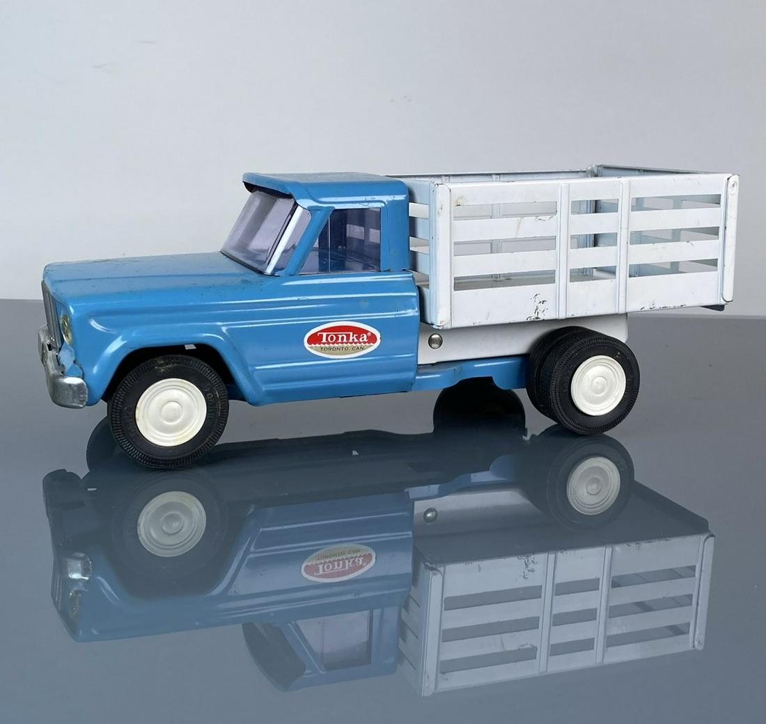 TONKA STAKE TRUCK: ORIGINAL DECAL (TONKA - TORONTO, CA) AND PAINT. VERY GOOD CONDITION. 10"X4"X4"