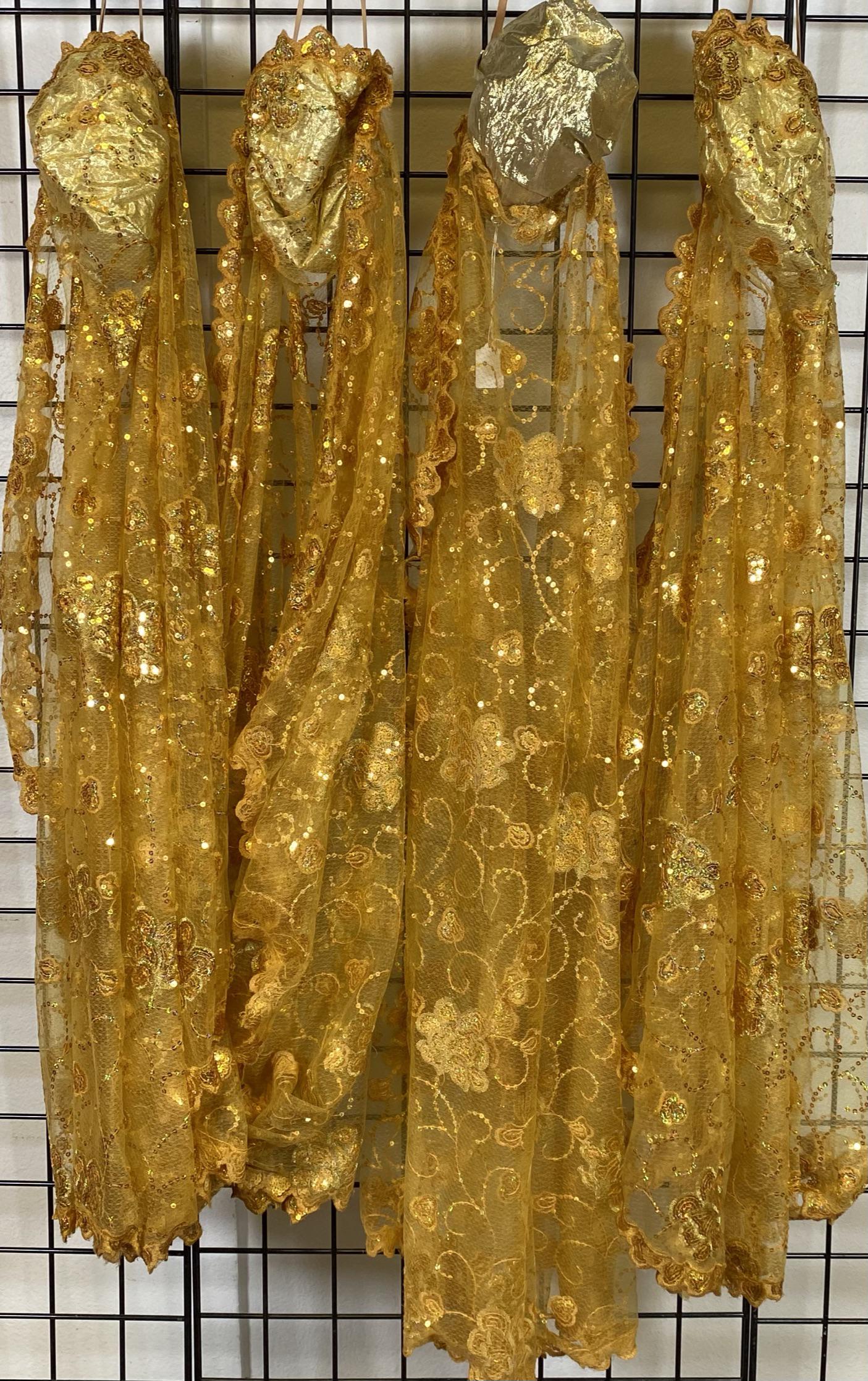 4 GOLD SEQUIN CAPS WITH VEILS: JOANNE WILSON COLLECTION.
