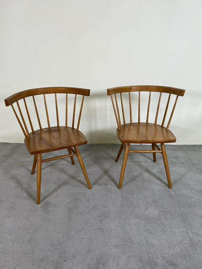GEORGE NAKASHIMA FOR KNOLL STRAIGHT CHAIRS: PAIR OF CLASSIC EXAMPLES. GOOD VINTAGE CONDITION. HAVING LIGHT WEAR CONSISTENT WITH AGE, A COUPLE OF CONSPICUOUS AREAS OF LOSS, LOOSE JOINERY AT BACK SPINDLES.