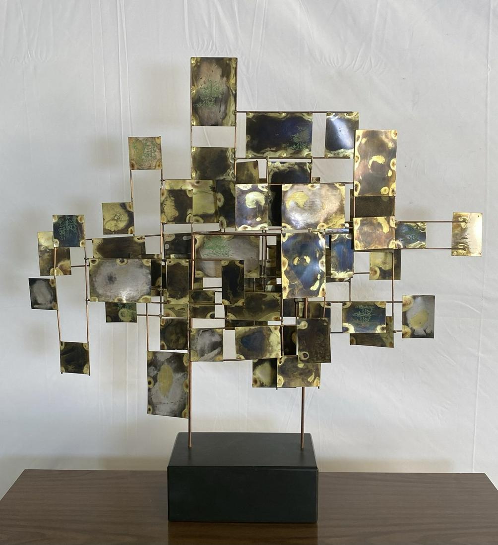 CURTIS JERE METAL TABLE SCULPTURE: SIGNED. PLATE ON WIRE GRID ON WOODEN BASE. 28"H