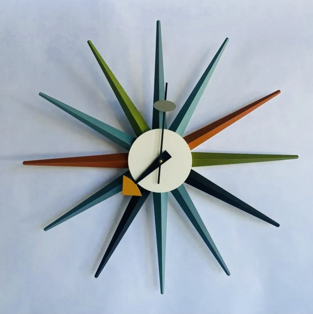 GEORGE NELSON - VITRA DESIGN SUNBURST CLOCK: NELSON RE-EDITION WITH LABEL. 19"