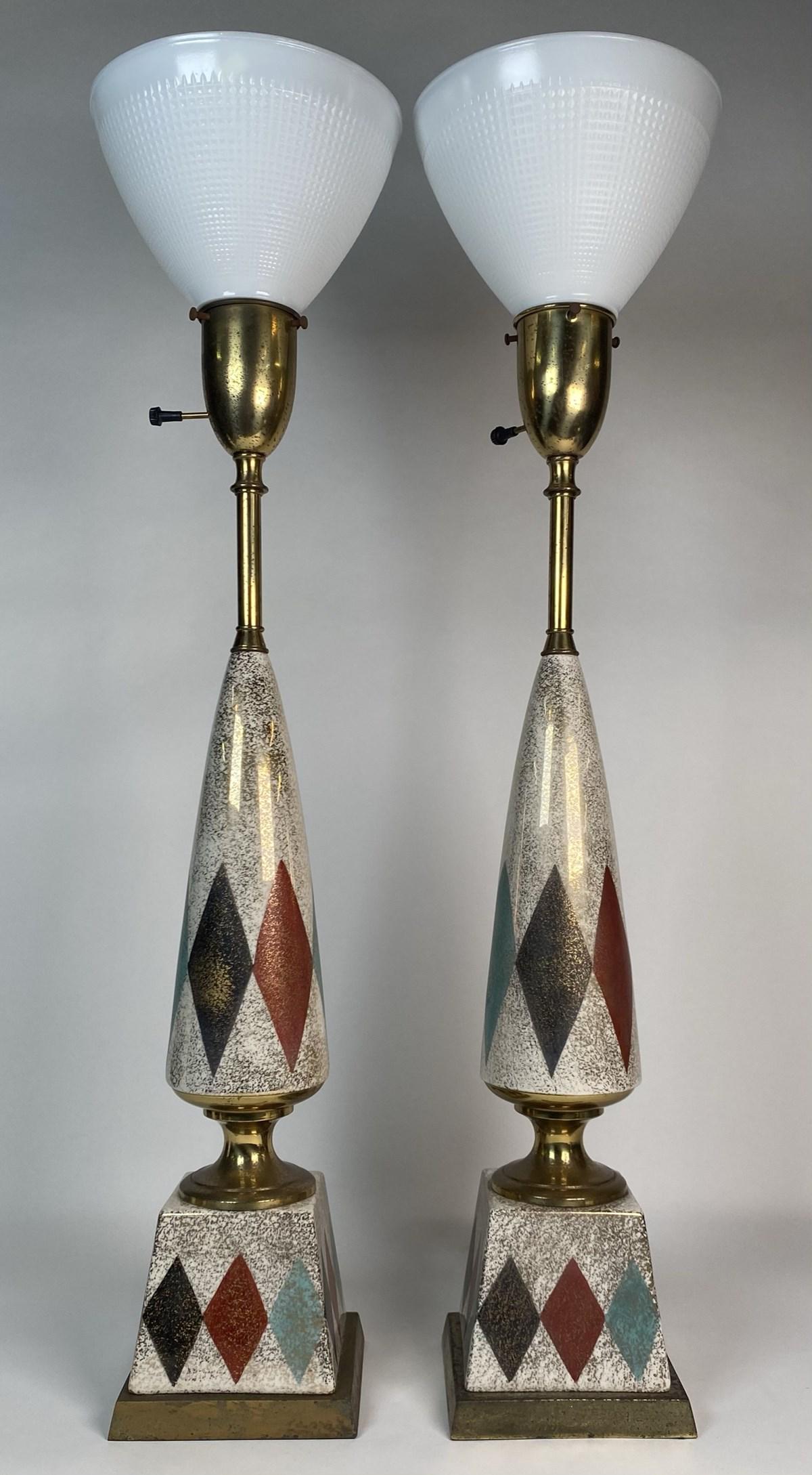 PAIR - VINTAGE TABLE TORCHIERE LAMPS: HAVING DIAMOND AND GILT ACCENTS WITH CERAMIC BODY AND BRASS STEMS. 32"