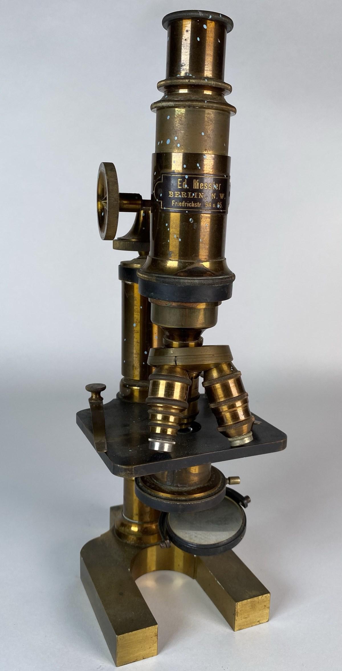ED MESSTER BRASS MICROSCOPE: HAVING FOREIGN PAINT SPECS, SOLD AS IS. 12"H