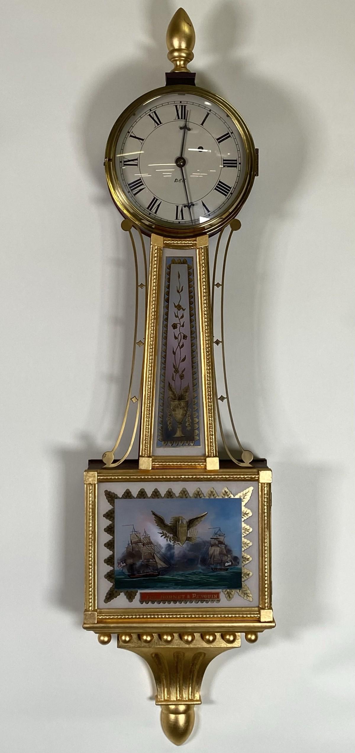 DINO ARGENTINI BANJO CLOCK: LABELED: MANUFACTURED BY DINO ARGENTINI, REPRODUCTION OF THE SIMON WILLARD IMPROVED BANJO TIMEPIECE. PENDULUM, NO KEY. 40"H