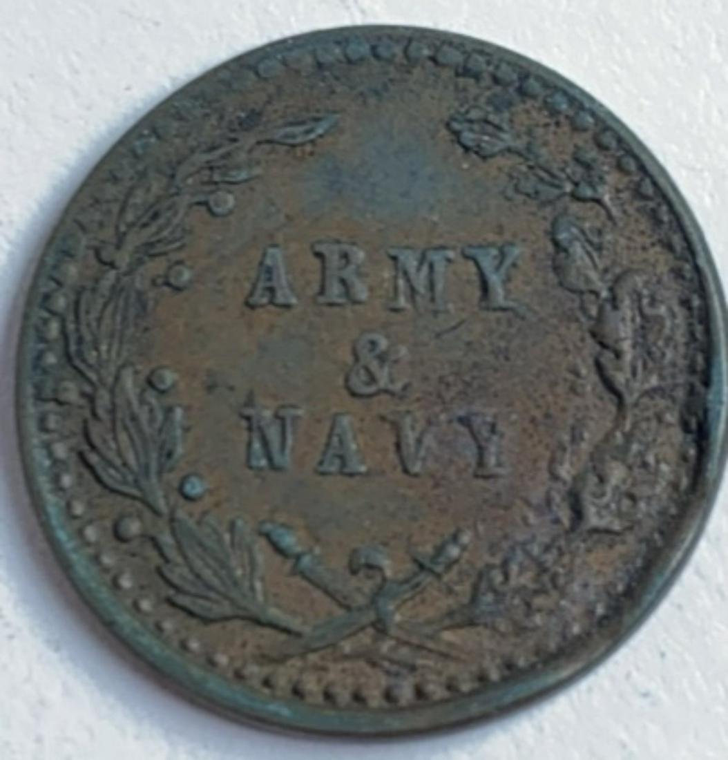 CIVIL WAR TOKEN: OBV. UNION CANNON, DRUM & FLAGS. REV. ARMY/NAVY.