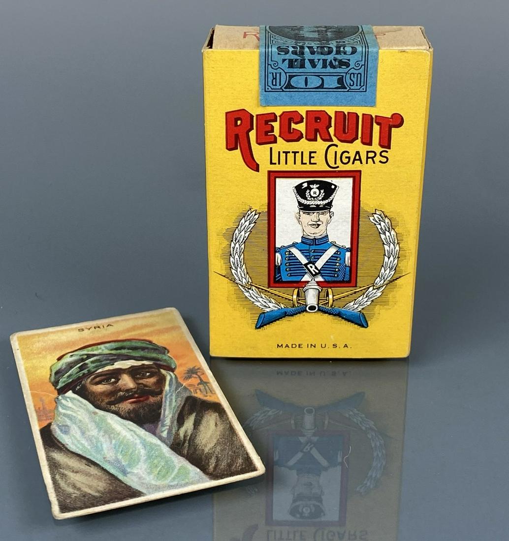 Recruit Little Cigars unopened pack T113 card: Recruit Little Cigars unopened pack, Series 125 stamp dated December 1955. Liggett & Myers Tobacco Co. Syria T113 Types of Nations card from 1910 included.