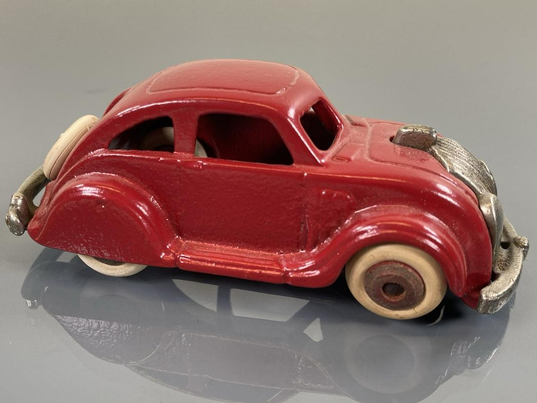 ARCADE AIRFLOW SEDAN: CAST IRON IN RED. RESTORED. 4"