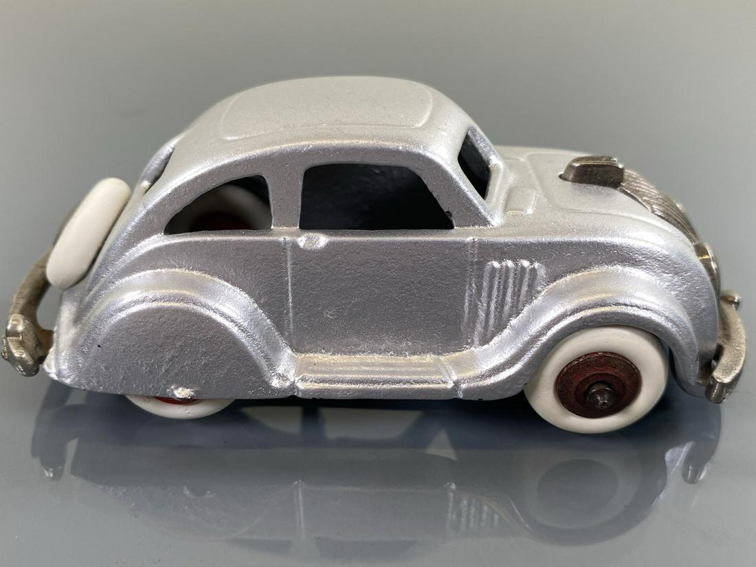 ARCADE AIRFLOW SEDAN: CAST IRON IN SILVER. RESTORED. 4"