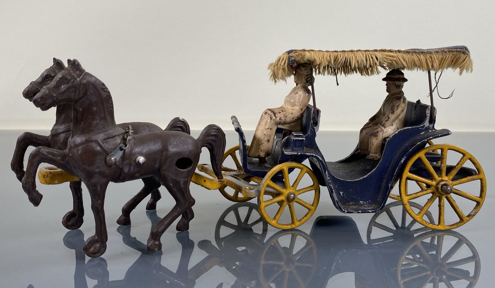 VINTAGE HORSE AND BUGGY TOY: WITH RIDERS. ORIGINAL FABRIC TOP WITH FRINGE. WEAR. 11"