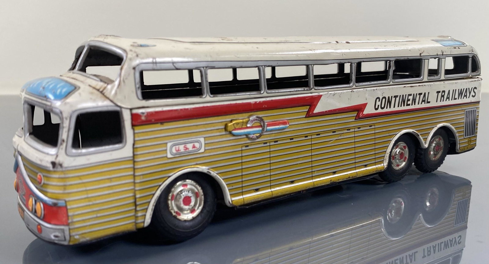 TIN LITHO PASSENGER BUS: ORIGNAL WITH WEAR. FRICTION. 10"