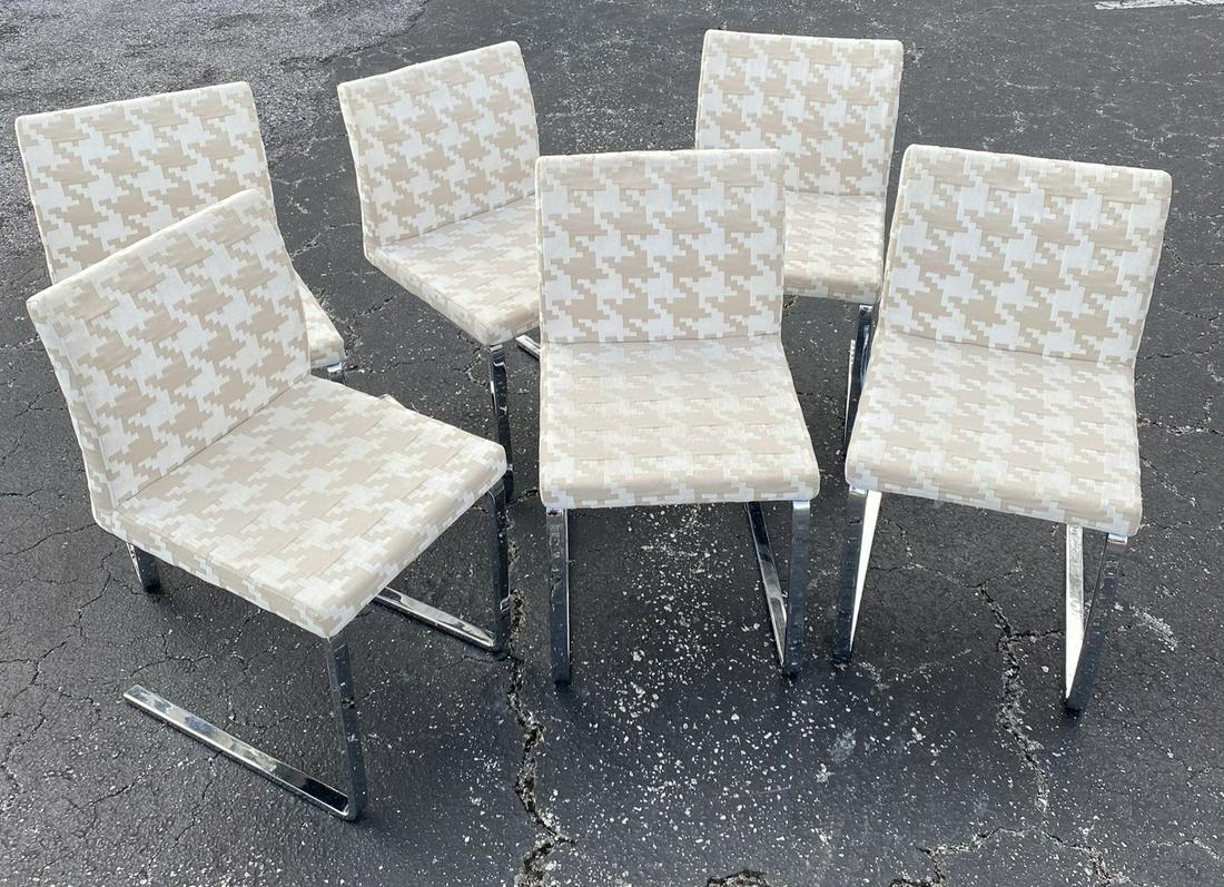 MANNER OF MILO BAUGHMAN CANTILEVER CHAIRS: 6 CHAIRS IN THE STYLE OF MB HAVING HOUNDSTOOTH CLOTH UPHOLSTERY AND BRIGHT HEAVY CHROME STRUCTURE.