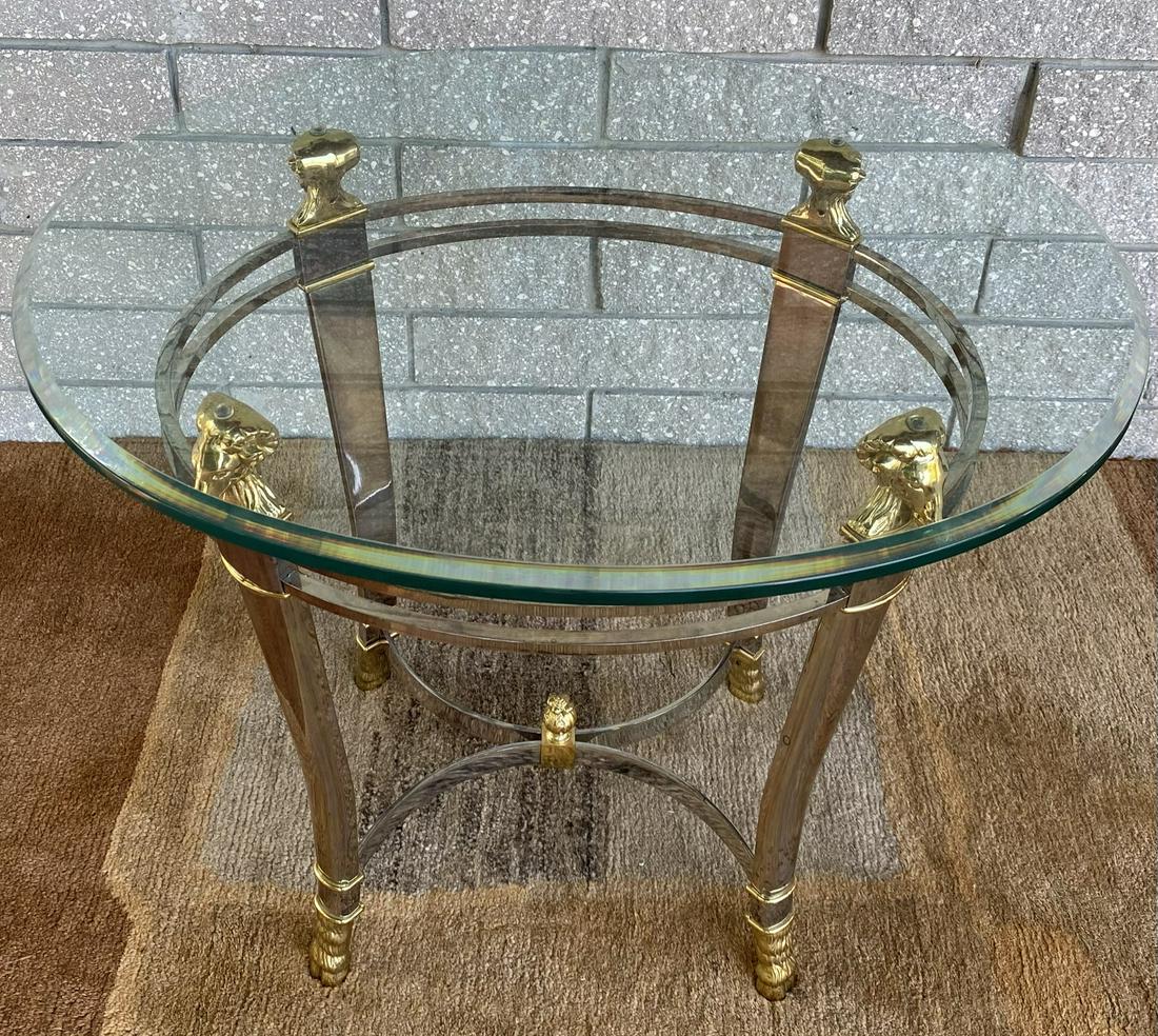 MAISON JANSEN STYLE COFFEE TABLES: HEAVY TWO-TONED BASE WITH GLASS TOPS. STAINLESS AND BRASS WITH GLASS TOP. 23"X27"X23"