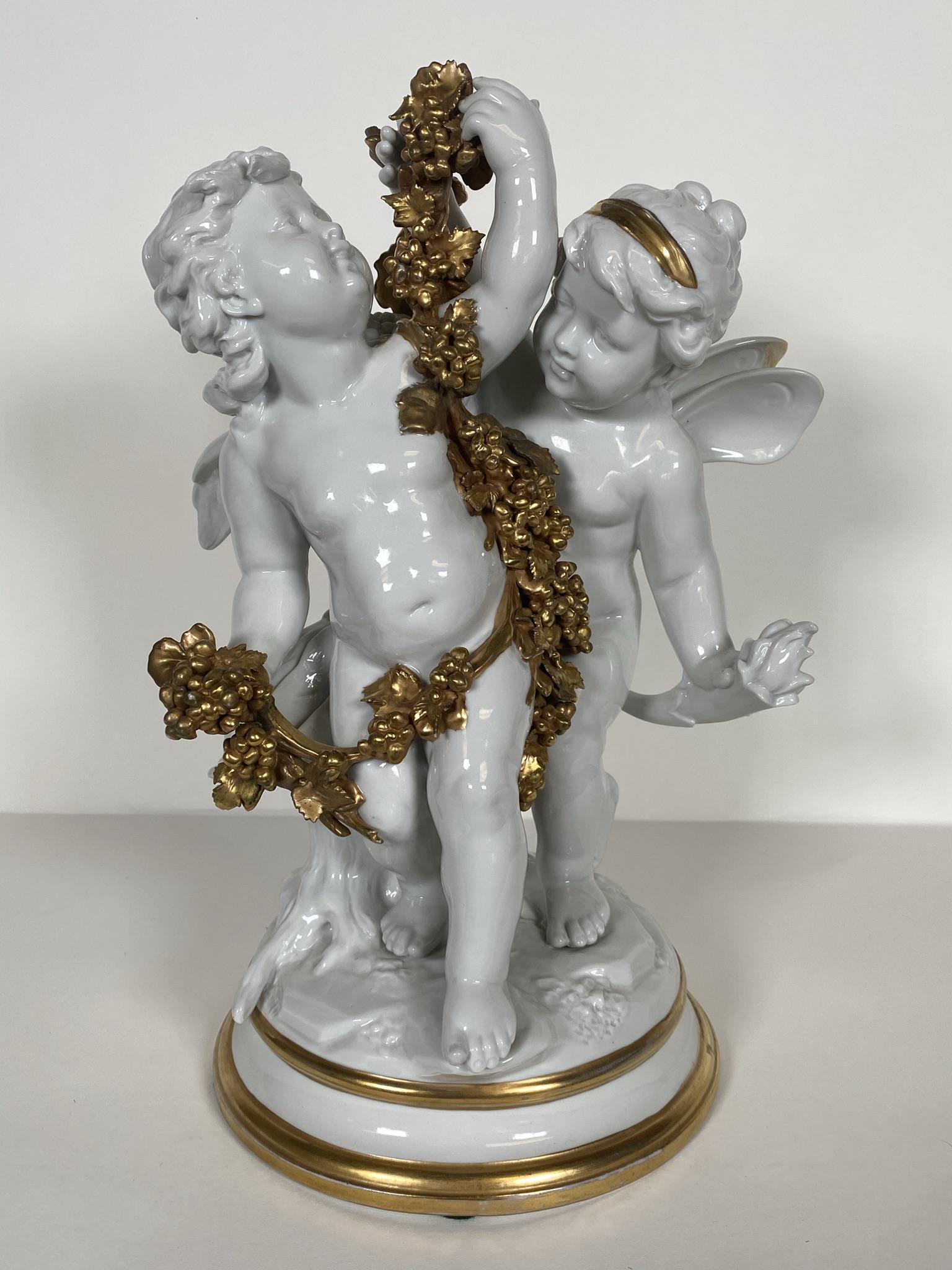 ITALIAN PARIAN PORCELAIN CHERUB: HAVING GILDED GRAPES. 13"