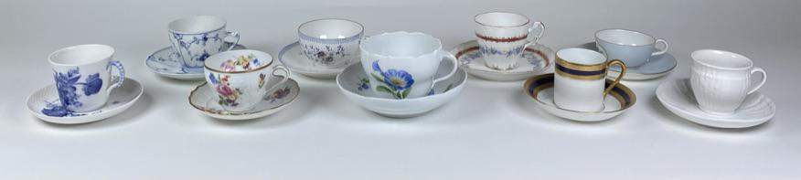 GROUPING OF TEA CUPS WITH SAUCERS: TWO PIECES HAVING HAIRLINES.