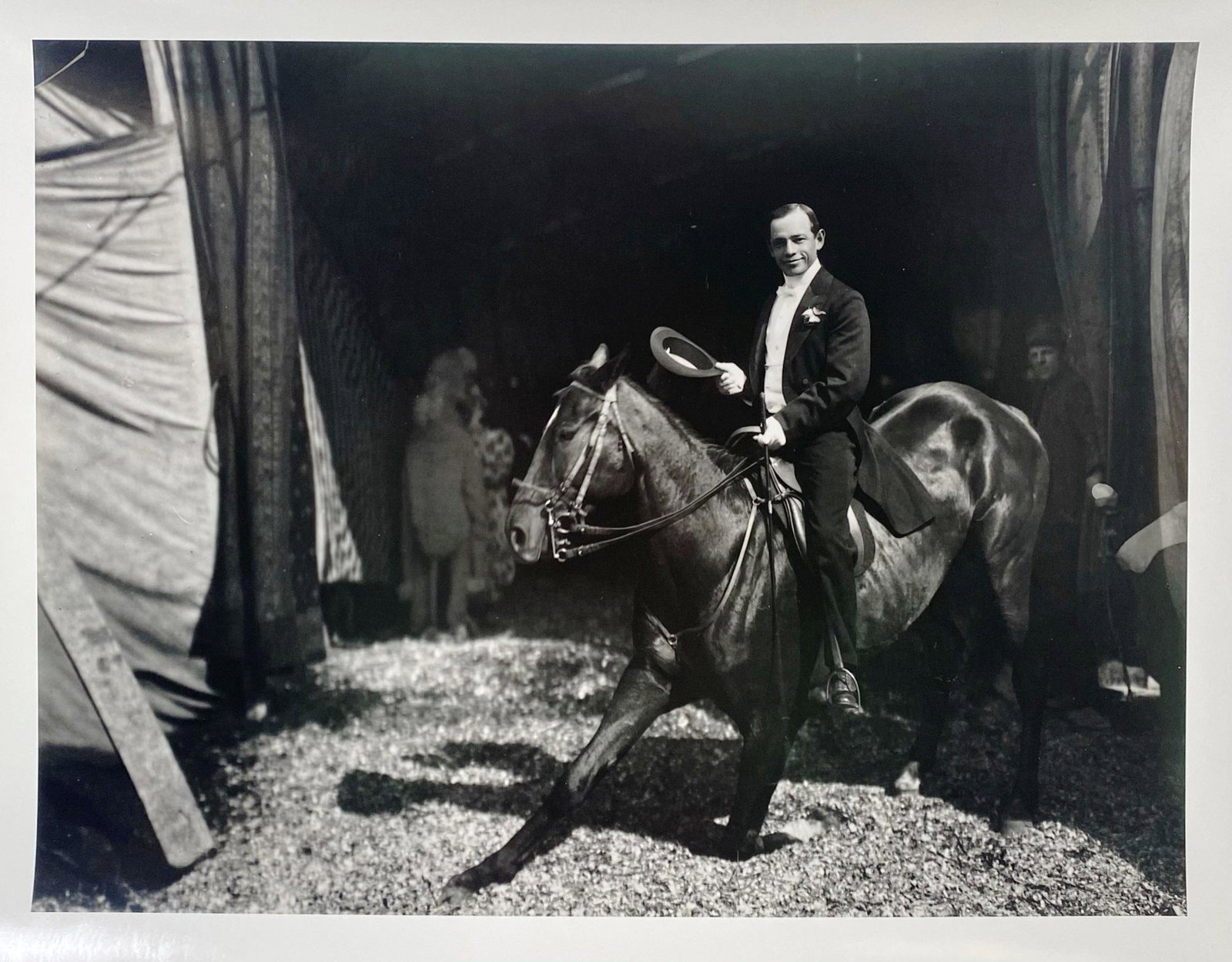 FREDERICK W. GLASIER SILVER GELATIN PHOTOGRAPH: HORSE WITH RIDER. FROM THE JOHN HURDLE COLLECTION (FORMER CURATOR OF THE RINGLING MUSUEM - SARASOTA, FLORIDA). THE MUSEUM COMMISSIONED JERRY ULESMANN TO PRINT FROM THE ORIGINAL FREDERICK W. GLASIER GL