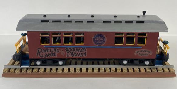RAMSEY CIRCUS TRAIN CAR MODEL: FATHER JERRY HOGAN COLLECTION. A HAND-MADE MODEL OF THE RBBB CIRCUS MINISTRY CHAPLAIN CAR. SIGNED RAMSEY. 22"X5"X7"