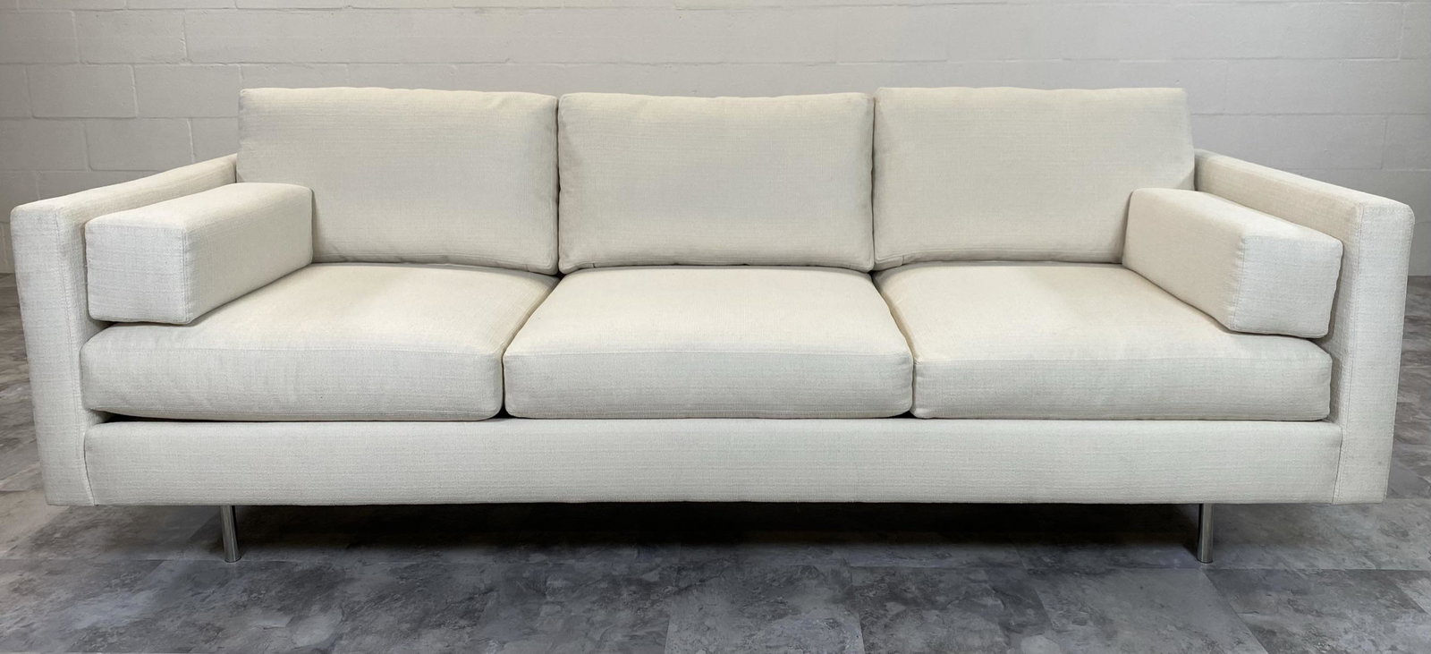 MILO BAUGHMAN-THAYER COGGIN SOFA: LABELED, OFF-WHITE UPHOLSTERED, SQUARE-BACK. CLEAN. 85"L, 33"D, 16" SEAT, 25" BACK.