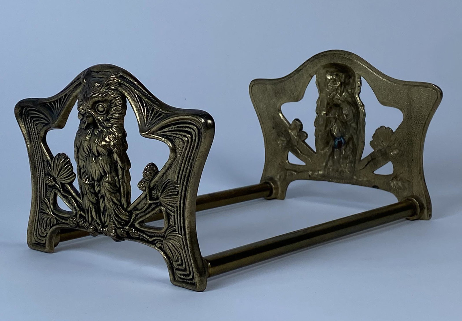 BRASS EXPANDING BOOK HOLDER: OWL MOTIF ON ENDS. ADJUSTS FROM 8.5" TO 15"