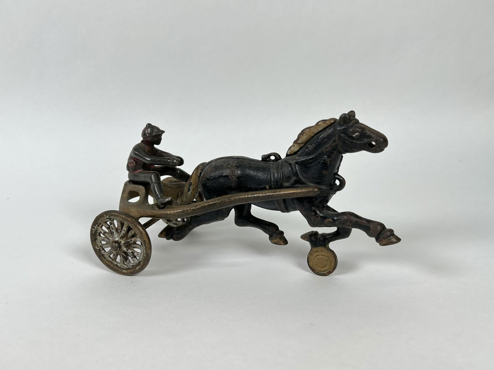 WILLIAMS CAST IRON SULKY HORSE TOY: ORIGINAL CONDITION.7"L