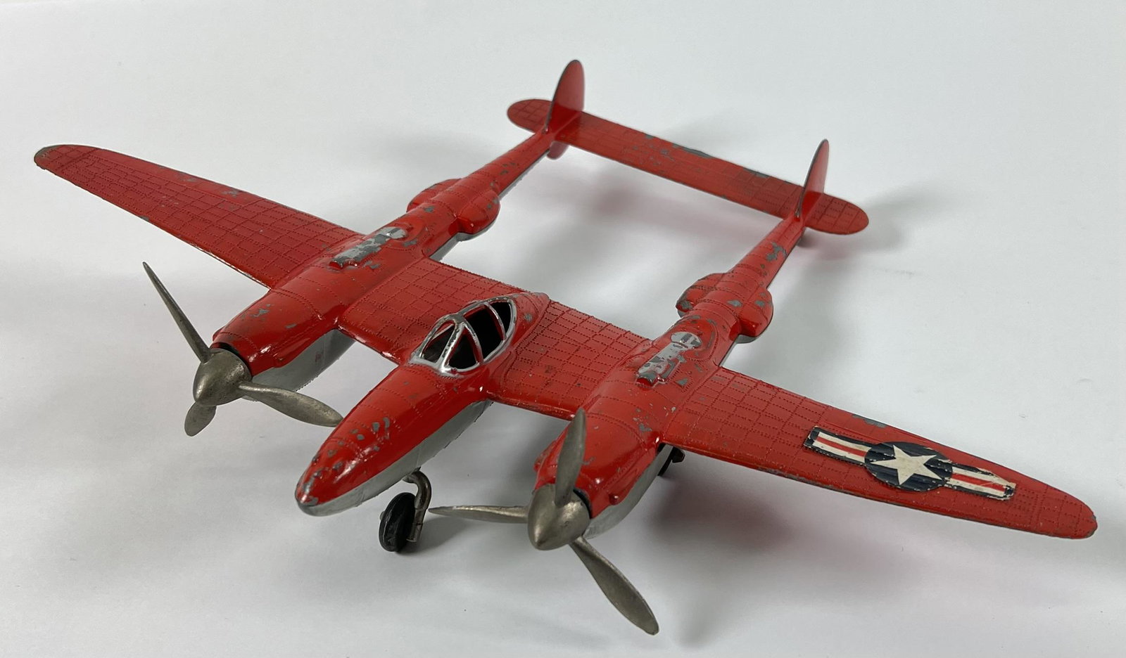 HUBLEY WWII P-38 FIGHTER AIRPLANE: ORIGINAL CONDITION, RETAINS ONE DECAL, DUAL PROP. 9"L