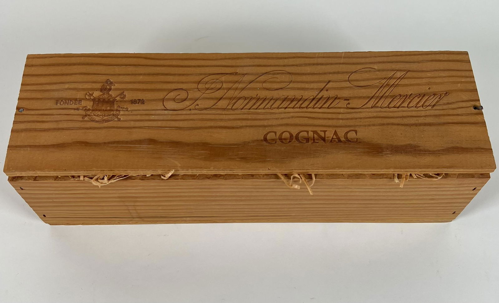 NORMANDIN MERCIER COGNAC: SEALED, IN ORIGINAL STRAW CRATE. SOLD AS COLLECTIBLE BOTTLE, CONTENTS INCIDENTAL AND NOT INTENDED FOR CONSUMPTION. NO SHIPPING, LOCAL PICK-UP.
