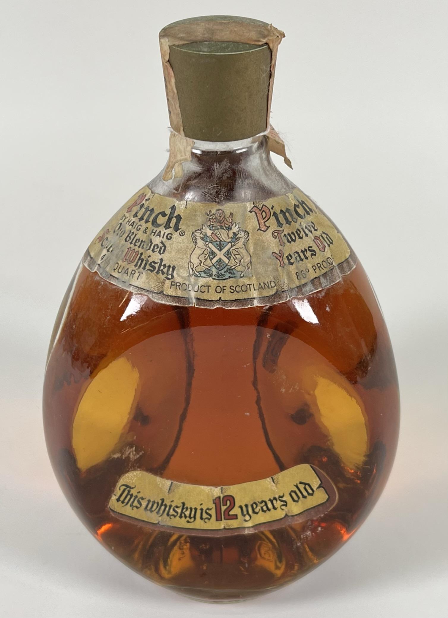 VINTAGE PINCH BY HAIG & HAIG WHISKY: SEALED. SOLD AS COLLECTIBLE BOTTLE, CONTENTS INCIDENTAL AND NOT INTENDED FOR CONSUMPTION. NO SHIPPING, LOCAL PICK-UP.