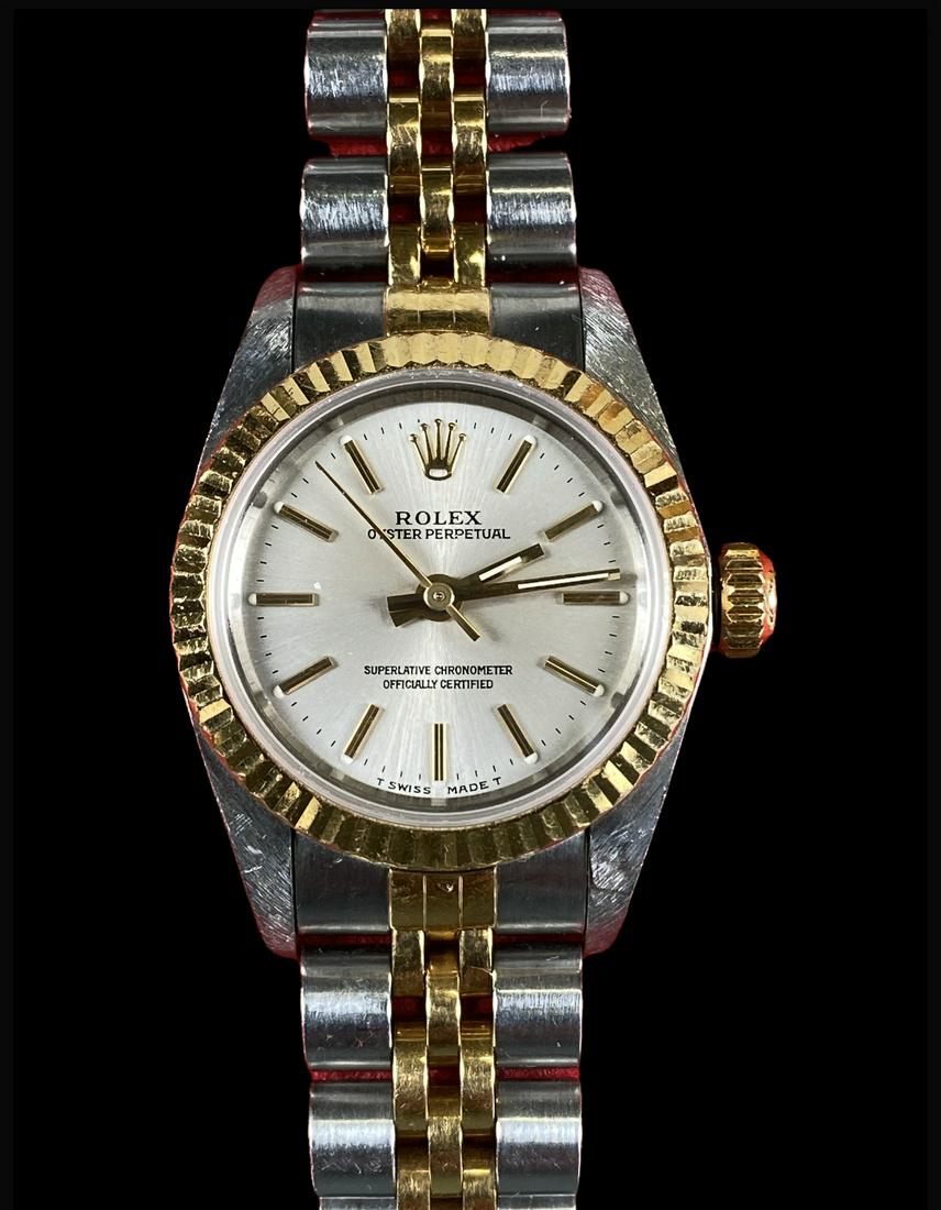 ROLEX OYSTER PERPETUAL LADIES WATCH: GENTLY USED LADIES WATCH WITH CERTIFICATE, MANUAL AND BOXES. 1997. RUNNING.