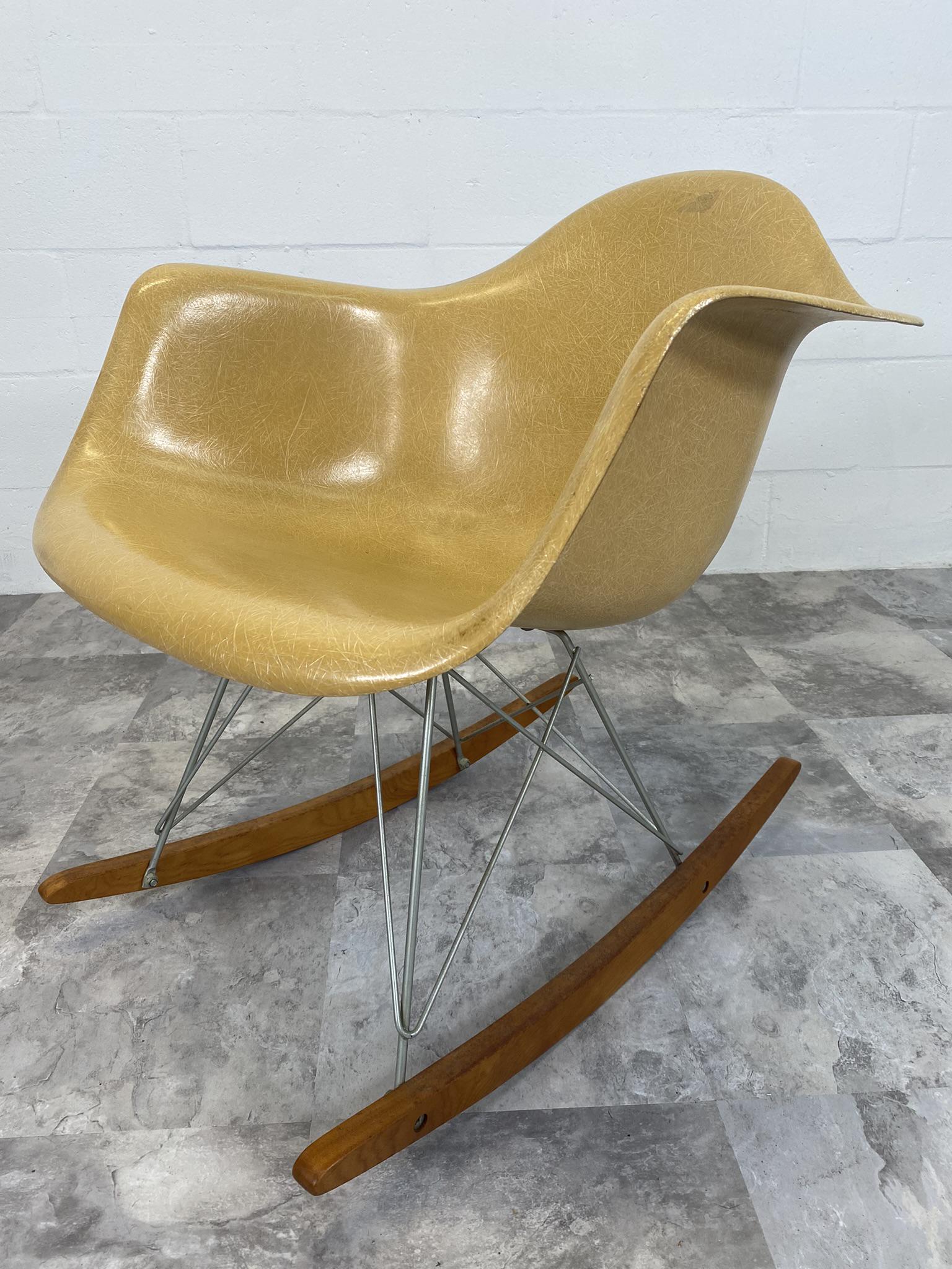 EAMES FOR HERMAN MILLER RAR BABY ROCKER: CHARLES & RAY EAMES FOR HERMAN MILLER BABY ROCKER. 1950'S YELLOW FIBERGLASS CHAIR, NICKEL PLATED STRUCTURE, BIRCH ROCKER RAILS. BUSHINGS GOOD. A NICE EXAMPLE.