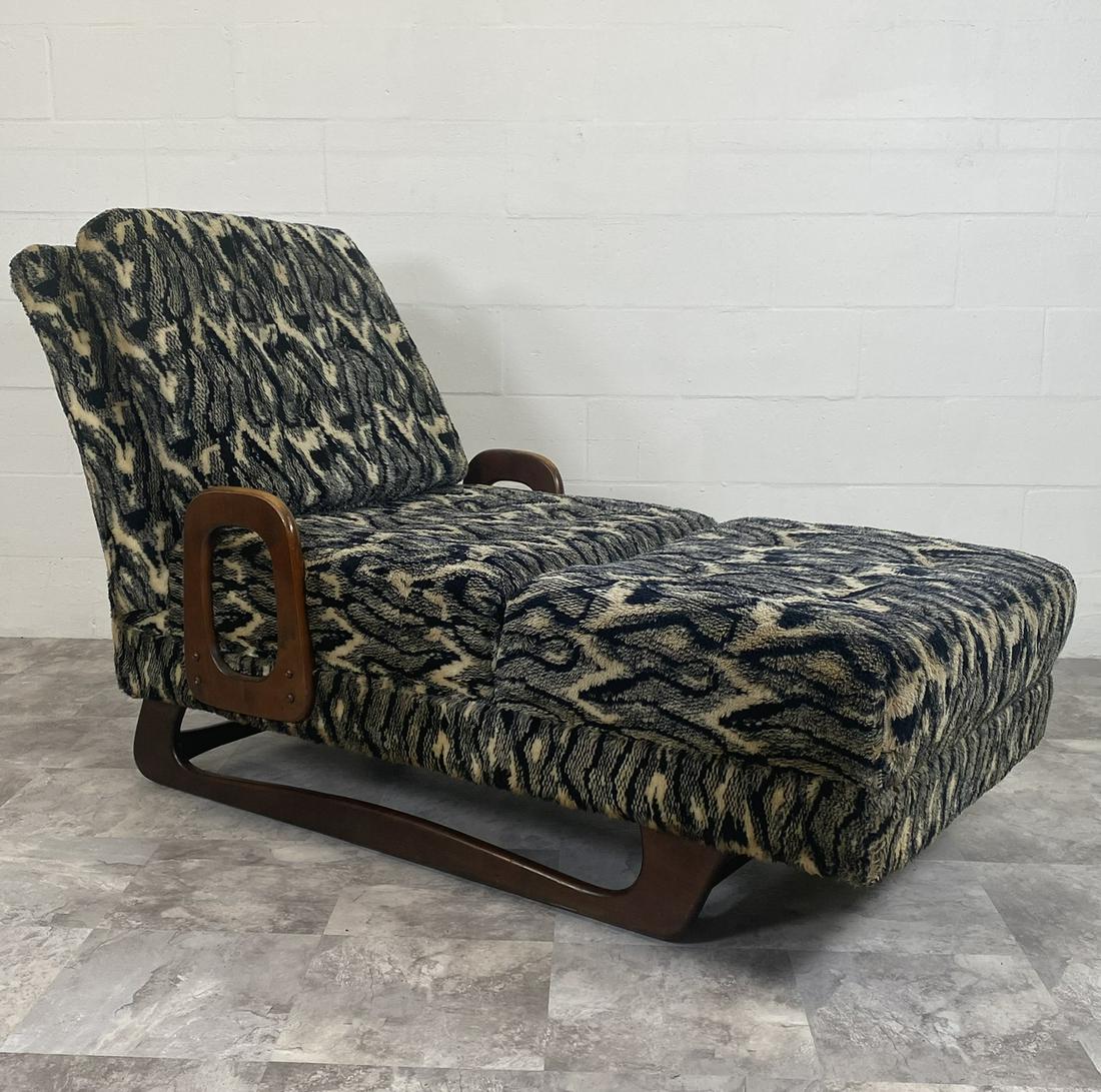 MID-CENTURY CARSON'S CHAISE LOUNGE: WALNUT STRUCTURE WITH SHAG UPHOLSTERY.