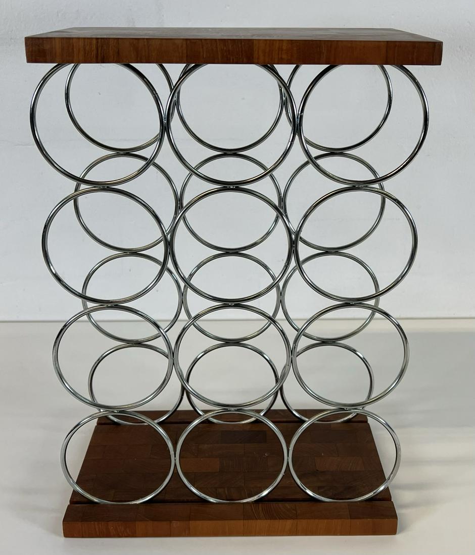 WINE CADDY: WINE BOTTLE HOLDER, CHROME RINGS IN WOODEN MOUNTING. 12W, 7D, 17H