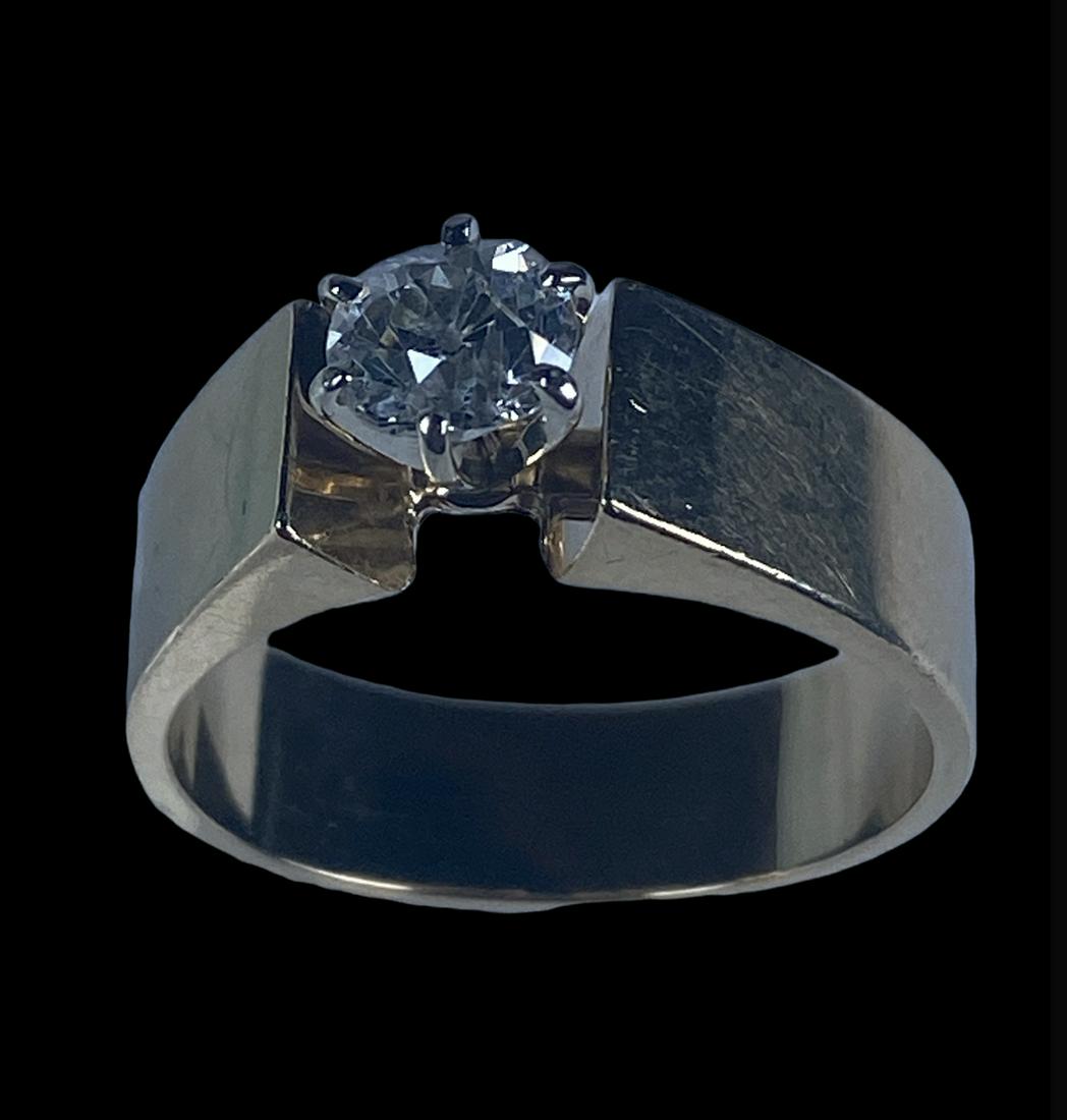 14K GOLD DIAMOND SOLITAIRE RING: SIZE 6. 4 GRAMS. .5 CT