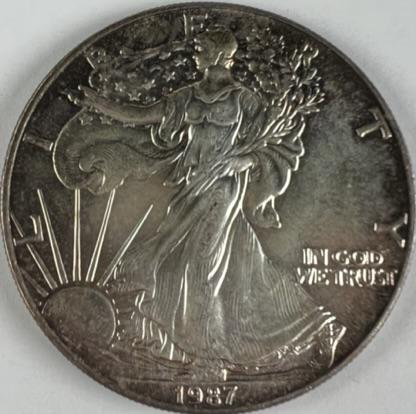 1987 AMERICAN SILVER EAGLE (1 of 2)