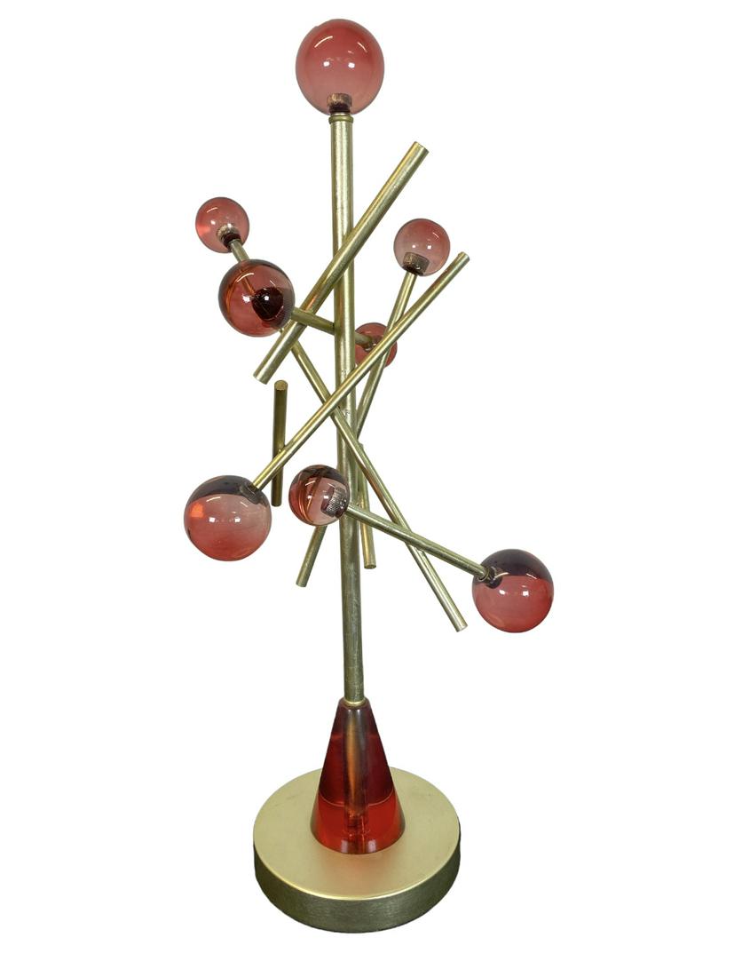 VAN TEAL TABLE SCULPTURE: METAL STRUCTURE WITH RED/PINK ACRYLIC BALL ENDS. LABEL. 26"H