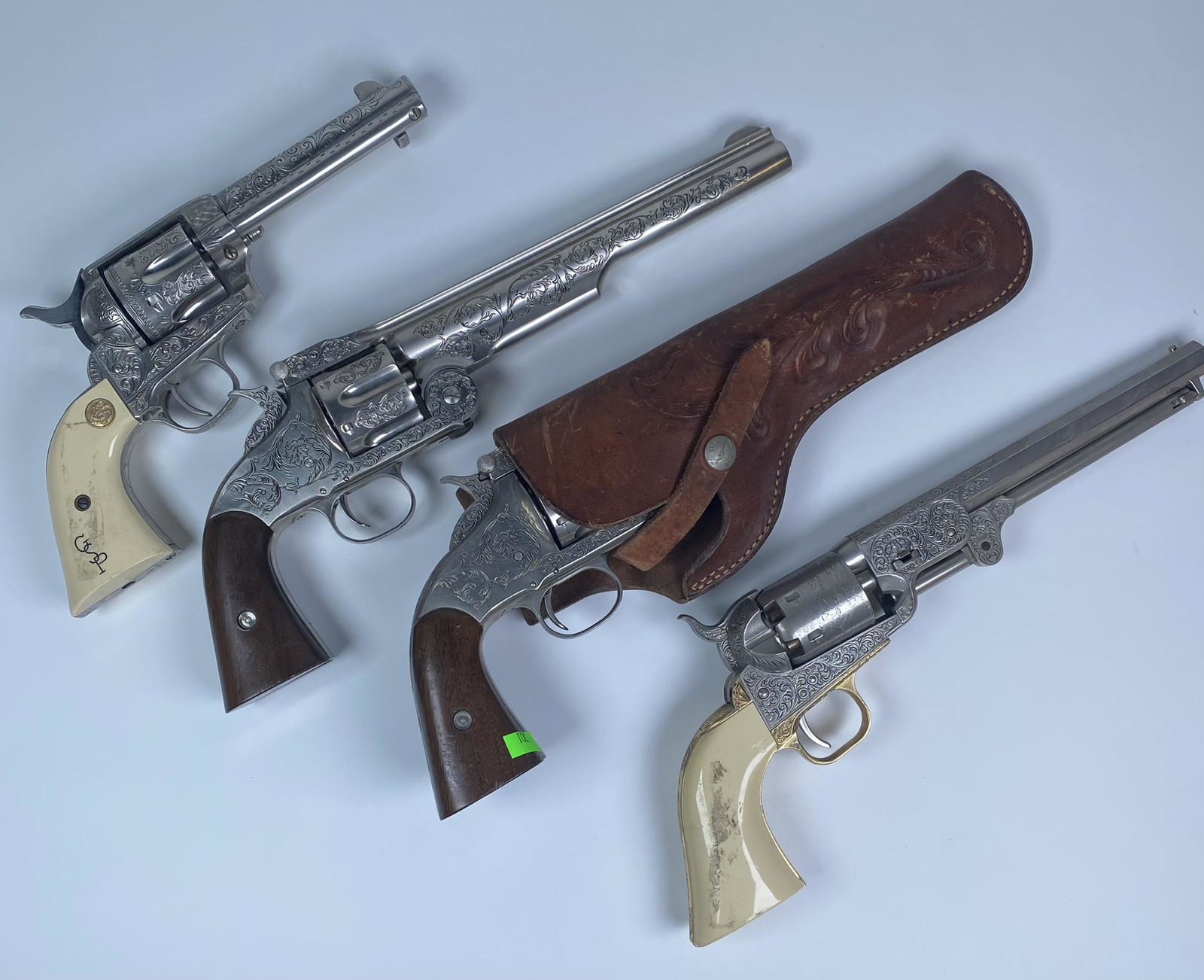 WYATT EARP REPRODUCTION REVOLVERS: REPLICA REVOLVERS AFTER THE COLT REVOLVERS AS USED BY WYATT EARP. SOLD AS NON-FUNCTIONING RELICS.