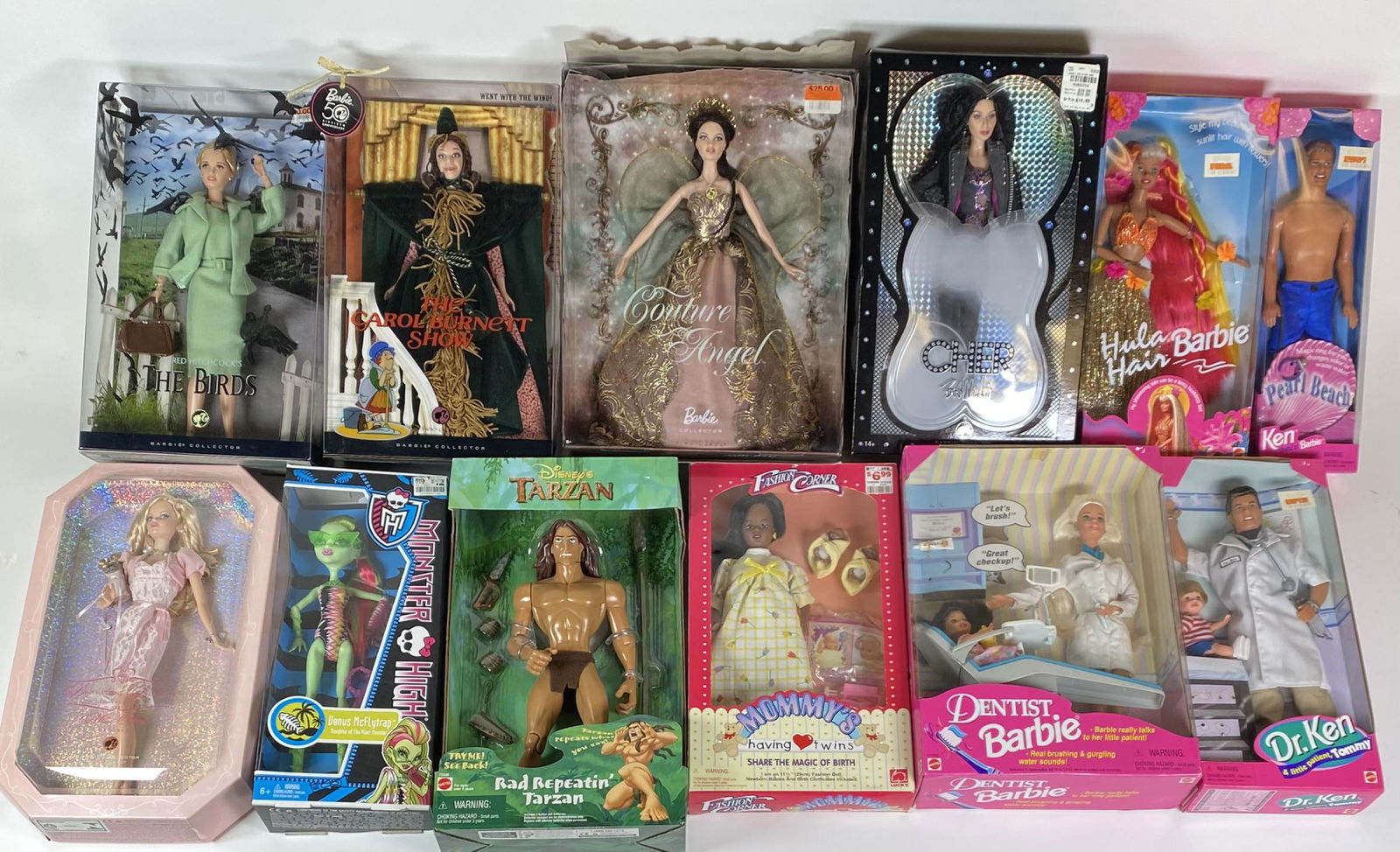 COLLECTION OF DOLLS: LOT OF 12 BARBIE, KEN, MONSTER HIGH, CHER, BURNETT DOLLS