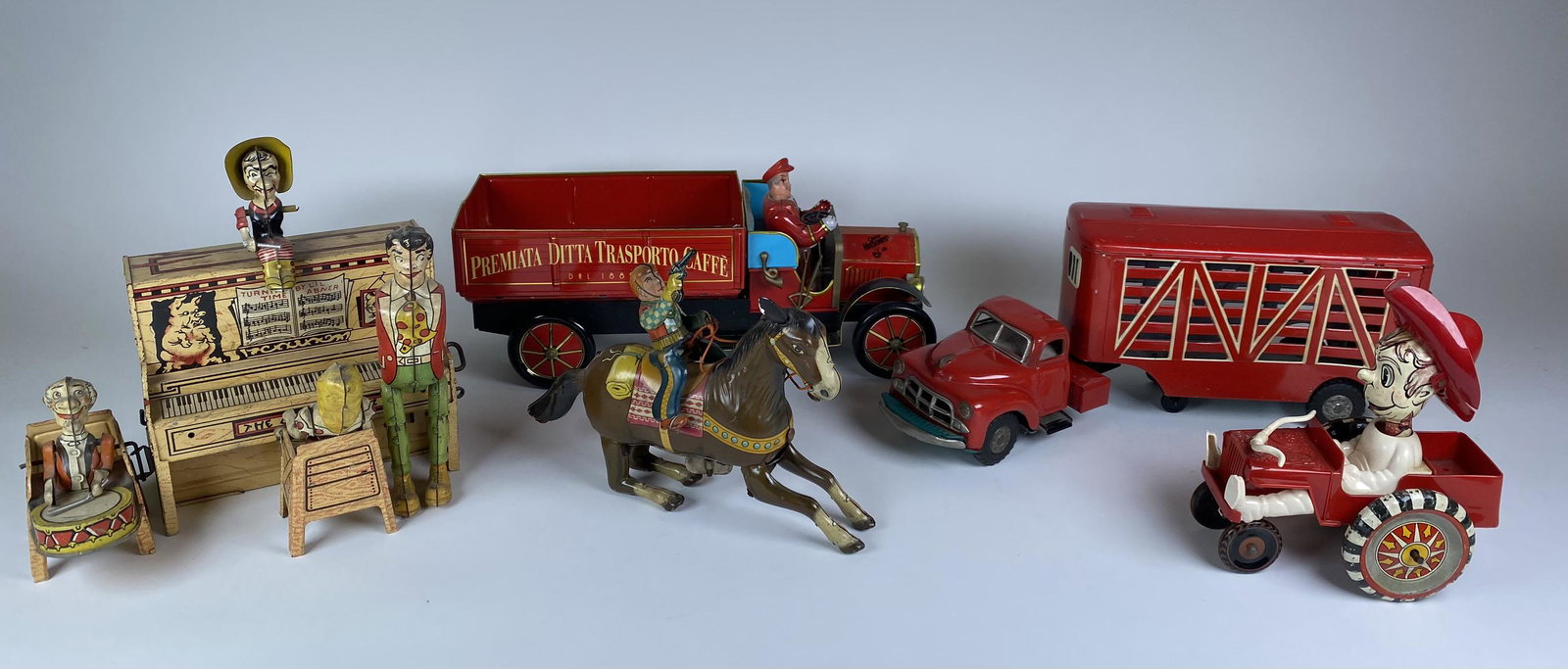 LITTLE ABNER, COWBOY HORSE, MARX CRAZY CAR, TRANSPORT TRUCK LOT: LITTLE ABNER, COWBOY HORSE, MARX CRAZY CAR, TRANSPORT TRUCK LOT. HORSE SPRING WEAK AND WILL NOT BOUNCE, CRAZY CAR HORNS BROKEN, GRANNY'S AND ABNERS ARMS MISSING. FRICTION WORKS ON JAPANESE TIN CATTLE 