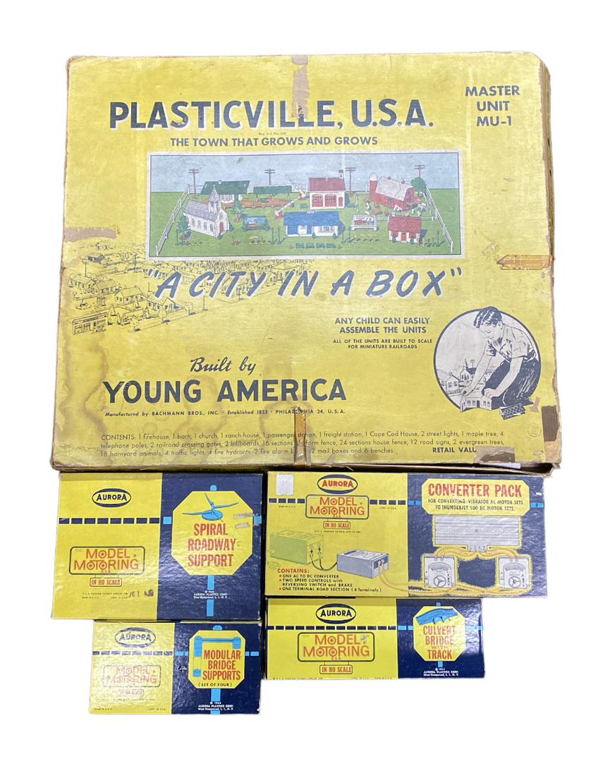 PLASTICVILLE AURORA MODEL MOTORING ACCESSORY SET: PLASTICVILLE AND AURORA MODEL MOTORING ACCESSORY SET. ACCESSORIES AS SHOWN. MU-1 IS A LARGE 22" X 19" BOX