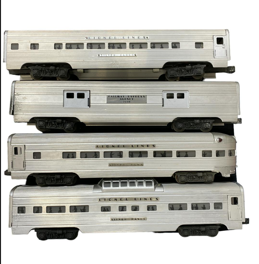 LIONEL SILVER DAWN, CLOUD, RANGE, AND AGENCY TRAIN SET: LIONEL SILVER DAWN, CLOUD, RANGE, AND AGENCY TRAIN SET. CARS 2530 AND 2531 PLUS OTHERS AS SHOWN.