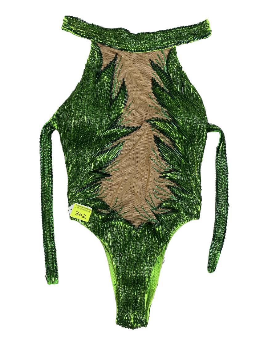 ZOPPE - SHERYLL FAMILY CIRCUS WARDROBE: EMERALD ONE PIECE WITH BUGLE BEAD DESIGNS. MID-BACK STRAP AND COLLAR. SMALL. THE ZOPPE - SHERYLL FAMILY HAVE BEEN ACTIVE IN CIRCUS AND SHOW PERFORMANCE FOR OVER 50 YEARS WITH FOCUS ON COMEDY ACTS, JUG