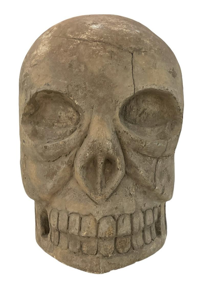 MONUMENTAL CARVED WOODEND SKULL: 15"