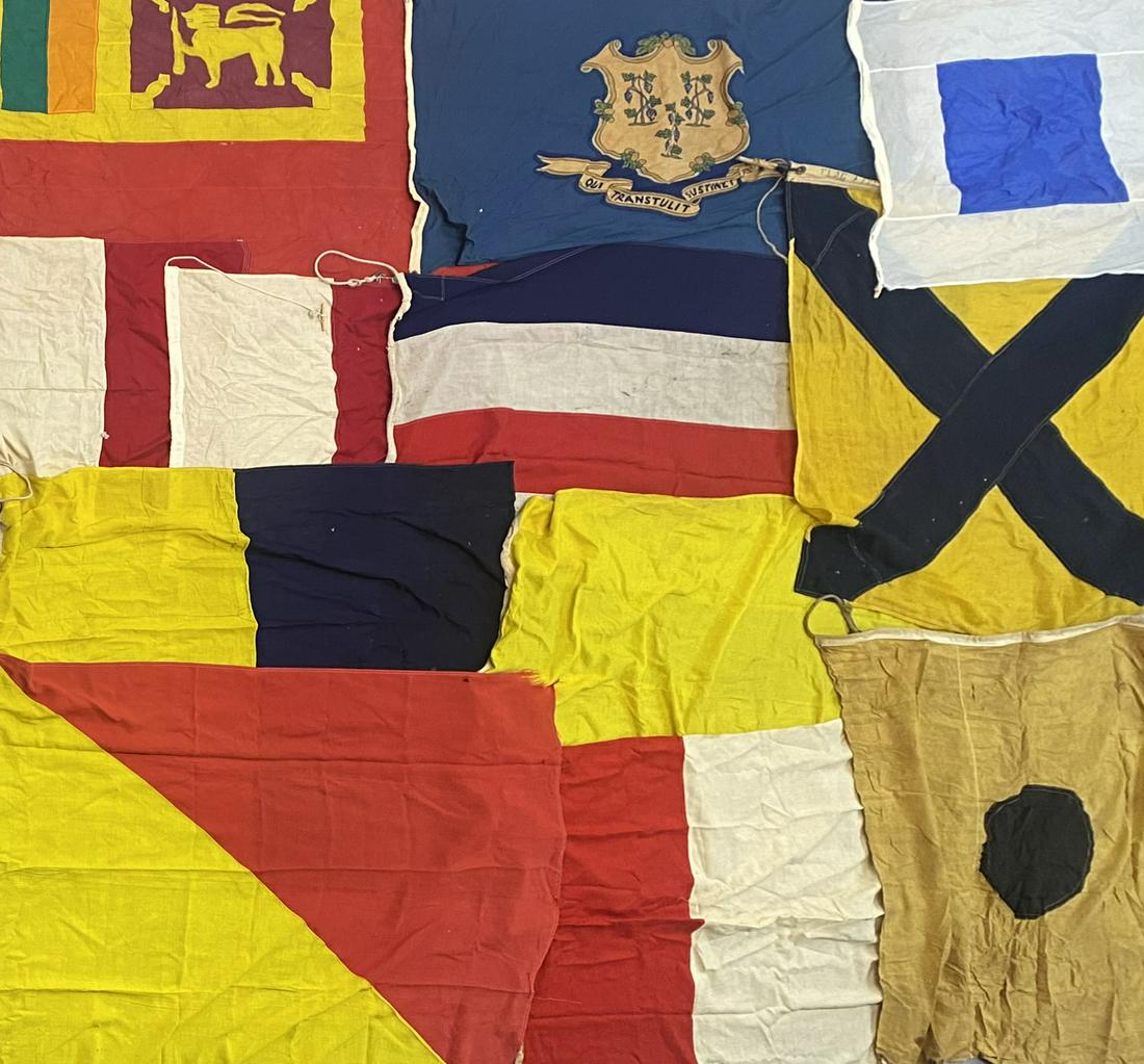 NAUTICAL SIGNAL CODE FLAGS: GROUPING OF INTERNATIONAL SIGNAL CODE FLAGS. LARGEST IS 46"X91"