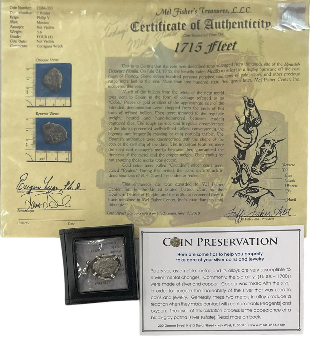 SHIPWRECK COIN - 2 REALES: SALVAGED FROM THE WRECK SITE OF THE SPANISH TREASURE FLOTILLA, C.1715. CERTIFICATE BY MEL FISHER TREASURES. 2 REALE COIN MOUNTED IN PENDANT.